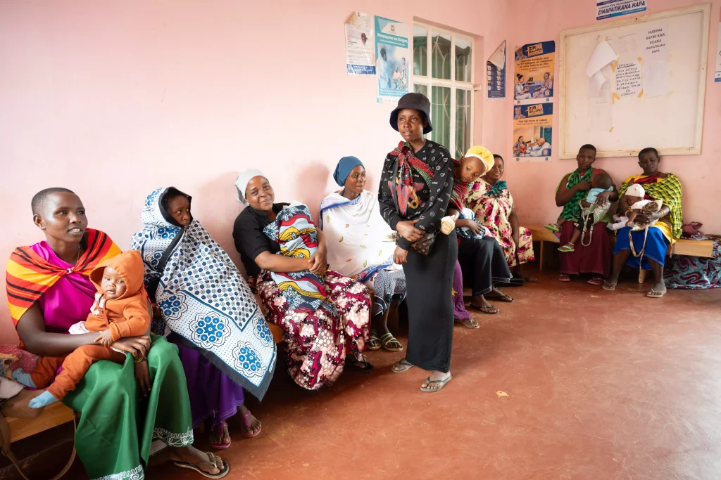 Mother and child receiving healthcare through FTK programs.